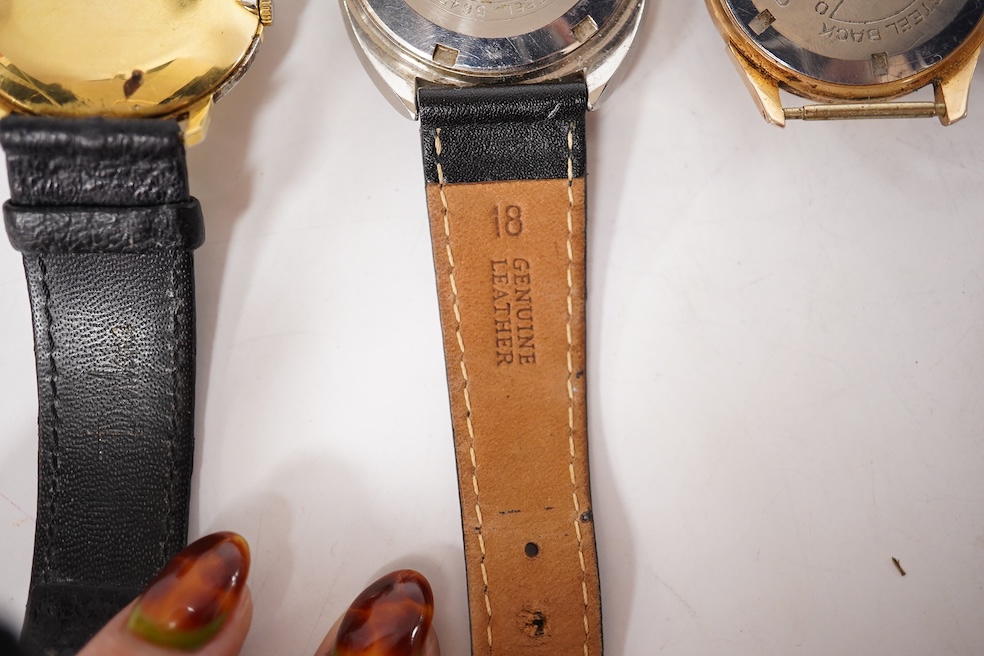 A gentleman's 1940's 9ct gold manual wind wrist watch(a.f.), together with four other wrist watches including Seiko, gold plated Girard Perregaux and Baume & Mercier Baumatic. Condition - poor to fair